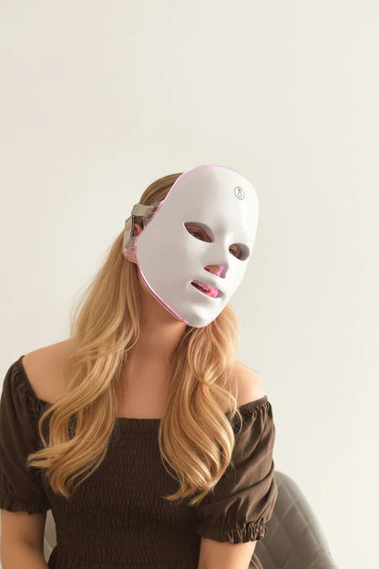 Lumière Pro LED Therapy Mask worn on face with illuminated LEDs